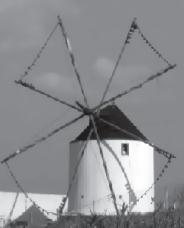 15. figura da esquerda, é uma fotografia de um moinho de vento de tipo mediterrânico, grupo ao qual pertence a maioria dos moinhos de vento portugueses.