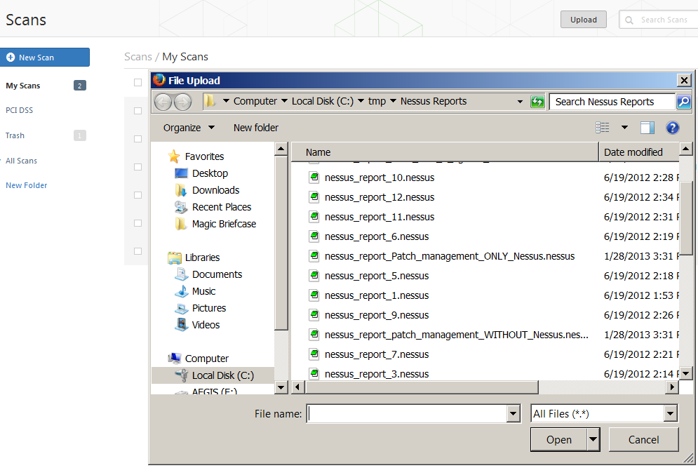 Para importar um relatório, clique no botão Upload (Fazer upload) na barra superior da tela Scans (Varreduras) para abrir uma janela de navegação de arquivos: Selecione o arquivo de varredura.