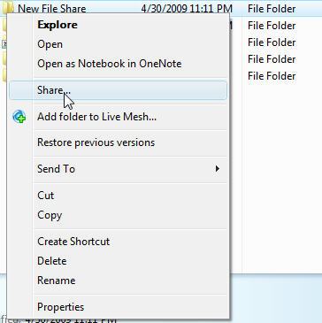 Reproduzir Ficheiros a partir de um Servidor Multimédia Manual do Utilizador página 53 Windows Vista 1. Localize a pasta com os ficheiros que pretende partilhar. 2.