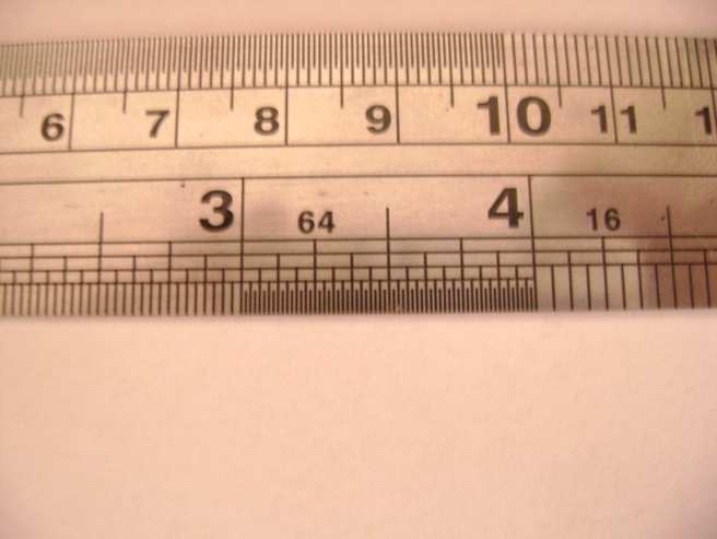6 3. - ESCALA O instrumento de medição mais simples utilizado é a régua graduada (fig.1), nas oficinas mecânicas são comumente chamadas de escalas.