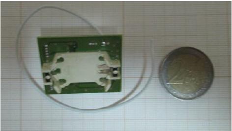 14 representa a implementação prática do dispositivo desenvolvido com os componentes soldados e com uma antena de λ\4 de comprimento de onda, obtida a partir de um fio condutor.