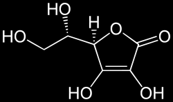 VITAMINA C ÁCIDO ASCÓRBICO O ácido ascórbico, de fórmula química C6H8O6, é um ácido pouco estável, que se decompõe facilmente por acção do calor e que oxida rapidamente em meio alcalino.