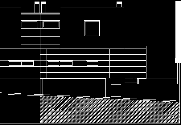 Figura 3 Alçado noroeste, fachada frontal da habitação O piso inferior, exibido na Figura 4, a cave, tem dois espaços não úteis, garagem e lavandaria, quanto a espaços úteis possui