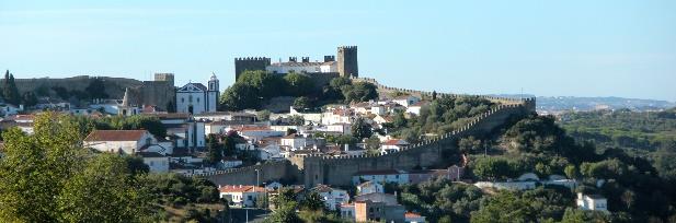 PORTUGAL FADO AO CENTRO Coimbra Fátima Nazaré Óbidos 2 dias 1º DIA: - ORIGEM COIMBRA FÁTIMA Saída dos locais de origem e viagem em autocarro grande turismo, Paragens pelo percurso para pequeno almoço