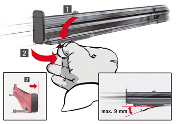 Ligação à grelha Mola amovível Comfort Clip Desmontagem Soltar a mola Comfort Clip dianteira: Empurrar para baixo a lingueta de fixação e afastar a mola ligeiramente em