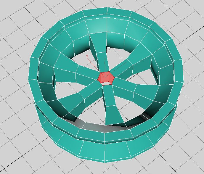 17 Aplique o comando Scale para reduzir o raio do centro em 80%. Em seguida, selecione a segunda e penúltima linha de vértices e aplique o Scale no eixo Y, para reduzir o espaço na borda do aro.