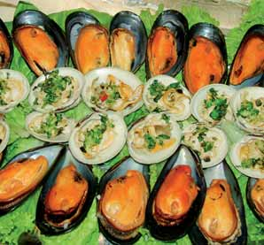 os mais exclusivos produtos cárneos, hortifrutícolas e do mar como centollas, lagostas de Juan Fernández, ostiones, choros e