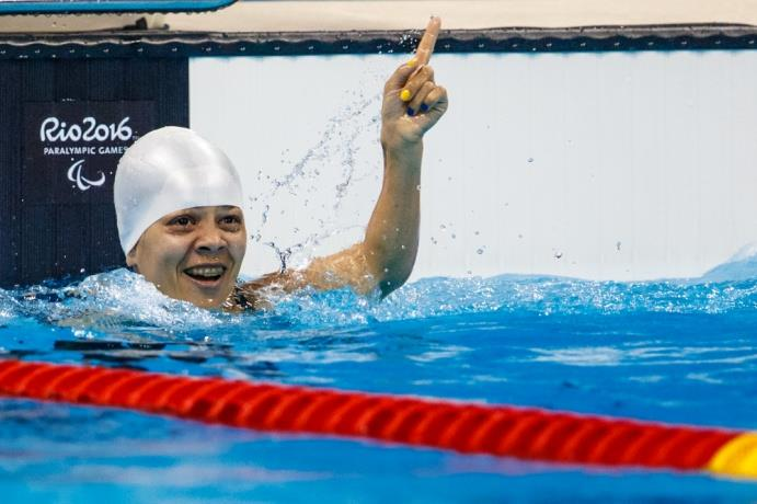 quatro ouros, três pratas e dois bronzes e se tornou o maior medalhista da Natação