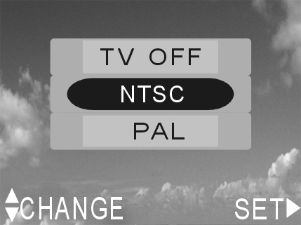 Defina NTSC ou PAL nas definições, consoante as definições do sistema da televisão.