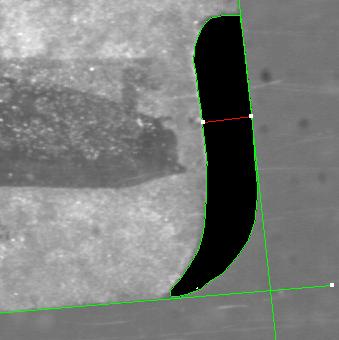 A identificação da correta área de contato entre a ferramenta e a peça obra foi obtida através do uso de um sistema de tratamento de imagens, composto por uma câmera Hitachi CCD, modelo KP 110, um