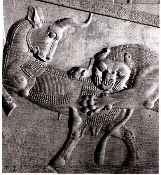 Gravura em baixo relevo na cidade de Persépolis: leão derruba um touro, como representação do poder imperial.