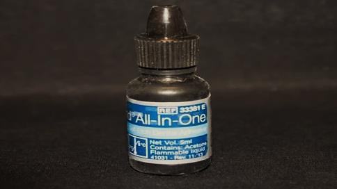 Estudo in vitro da resistência adesiva, por microtração, de um novo sistema adesivo de ionómero de vidro modificado por resina 6) AIO Optibond All-In-One (Kerr Corporation, Orange, CA, USA); (Fig.