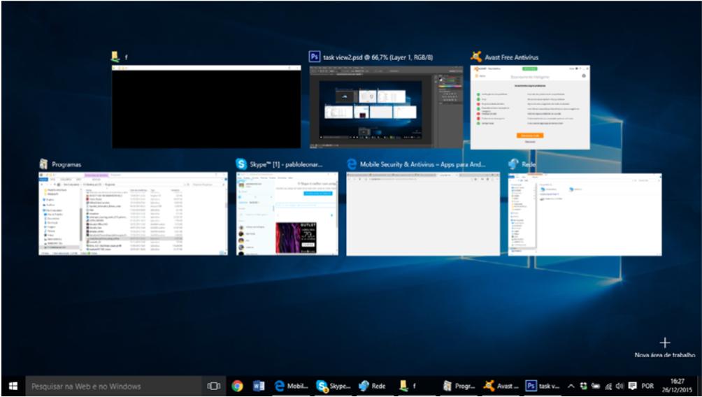 TASK VIEW Esse recurso pode ser acionado através do botão presente na barra de tarefas ou ainda pela combinação Winkey + Tab.