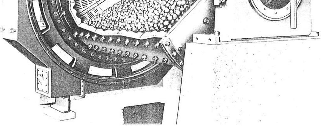 moedor (Metso, 2005). Na Figura 3.19 são mostrados moinhos de bolas com diferentes arranjos de descarga. Figura 3.19. Moinhos de Bolas - arranjos de descarga por Overflow e Diafragma, respectivamente (Rowland, 1978).