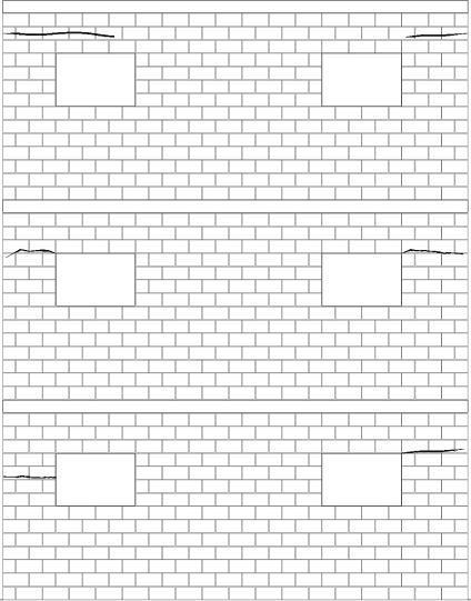 FIG. 4.19: Fissuras em alvenaria estrutural, devidas à retração de secagem das lajes de concreto armado 4.