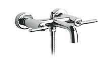 Monoblock bidet mixer with swivel flow regulator, pop-up waste and flexible supply hoses.