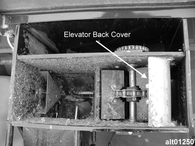 Ag Leader Technology Instalação do sensor de fluxo e da tampa traseira do elevador Peças necessárias para o procedimento: (1) Sensor de fluxo (1) Tampa traseira do elevador (1) Broca 9/32 pol.