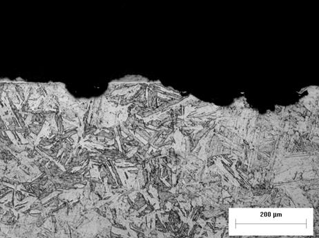 a) Pite Camada Composta Baquelite b) Pite Núcleo 200 µm Figura 4.