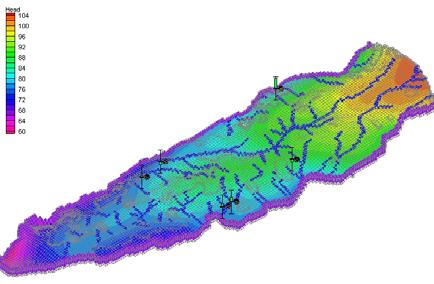 matemática do escoamento e do transporte em águas subterrâneas, calibrado com base nas medições de piezometria em furos e piezómetros monitorizados na área (Figura 9).