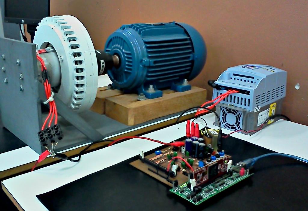 sinais digitais. Na figura 8 é apresentado o sistema de testes utilizando o alternador de um gerador eólico para a geração dos sinais de alimentação. Figura 8 Sistema de testes com alternador.