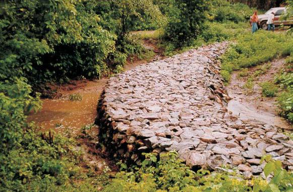 Diques de Retenção de Sedimentos e Adaptação ClimáNca Os diques de retenção de sedimentos do