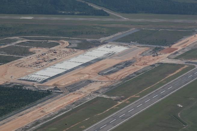 Aeroporto Internacional Hercílio Luz Florianópolis - SC 45 pátio de aeronaves que já está concretado. Já na Figura 2-34, é apresentado o layout do novo TPS após construído.