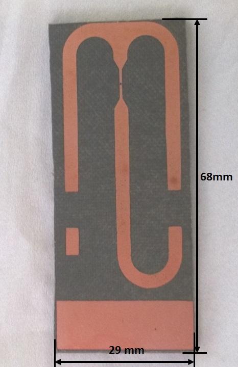 CBPF-NT-5/7 Figura 6: Fotografia da placa montada com o circuito ressonador. Figura : Fotografia da placa de circuito contendo o microslot.