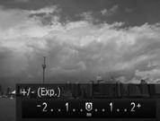 Ajustar o Brilho (Compensação de Exposição) É possível ajustar a exposição padrão definida pela câmara em incrementos de 1/3 de ponto no intervalo de -2 a +2.