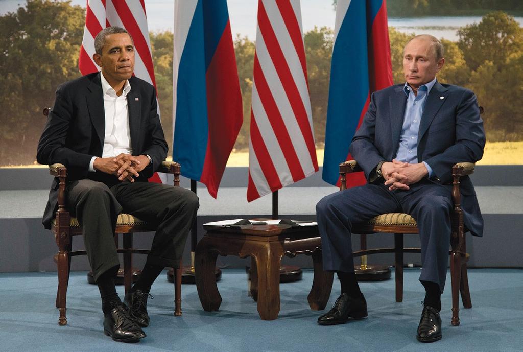 (Evan Vucci, Associated Press) O Presidente Barack Obama se reúne com o Presidente russo, em Enniskillen, Irlanda do Norte, 17 Jun 13.