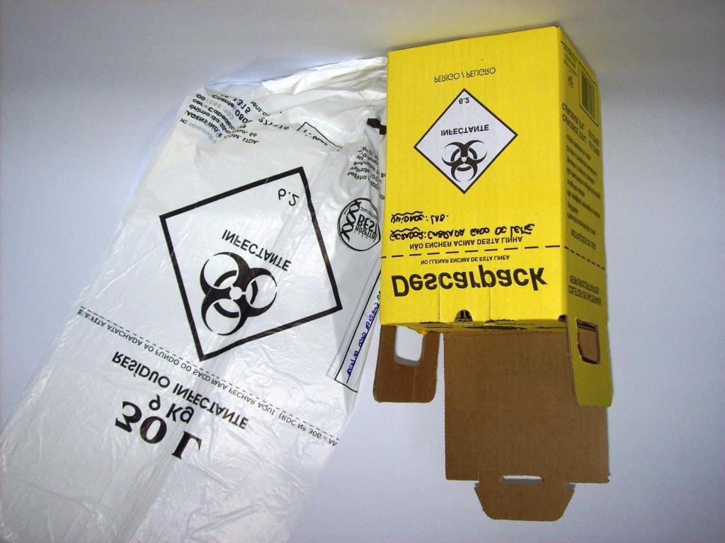 Relatório - Monitoramento dos resíduos biológicos na Embrapa 11 Figura 1. Saco branco leitoso e caixa para perfurante cortante (conforme ABNT) utilizados no gerenciamento de resíduos na Embrapa.