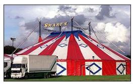 35. Uma tenda de circo (figura ao lado, à esquerda) está montada sobre uma armação. K figura ao lado, à direita, representa uma parte dessa armação.
