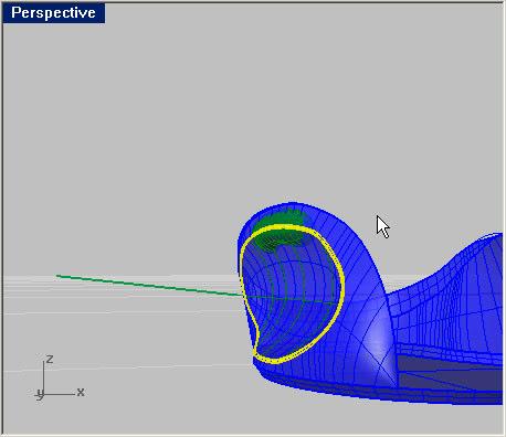 Na vista superior iremos desenhar a linha auxiliar, iniciando e finalizando a linha na curva projetada na superfície e definindo sua profundidade. Desenhá-la maior que o limite do desenho.