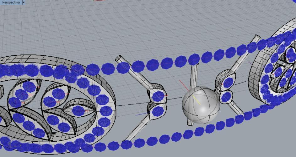 Use o comando Transform > Orient > On Curve para movimentar essa reta recém feita pela grande curva horizontal e, a partir da sua ponta, criar a esfera de raio 2,75mm.