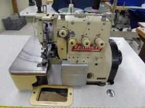 Piso 2 - Sala Máquinas º 28-242-Uma máquina de costura marca