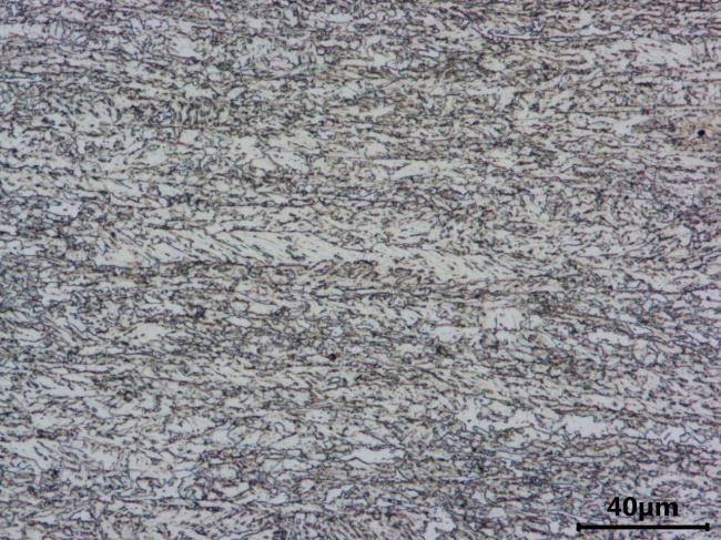 Propriedades mecânicas obtidas em chapas grossas de aço microligado ao MnNbTiVCrMo após tratamento termomecânico atendendo ao grau 80 ksi.