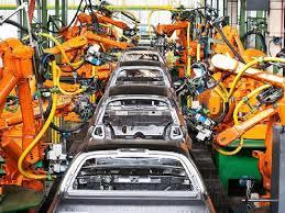 Linha de montagem Linha de montagem recebe ordem de taxa de produção de carros. O interesse é saber como o estoque de carros se comporta.