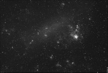 A grande nuvem de Magalhães, uma das galáxias mais próximas da Via Láctea. Câmara SBIG ST-10XE, Zeiss Sonnar 135mm. Pedro Ré (2005). Galáxia M 33 na constelação do Triângulo.