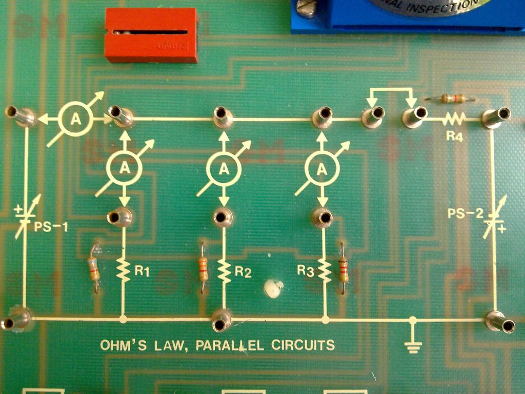 38 - Ligue o circuito constituído pelas resistências R1 a R3 com PSI = 7 V. a) Meça a corrente total de entrada do circuito. b) Indique como obter um modelo equivalente de Thévenin deste circuito.