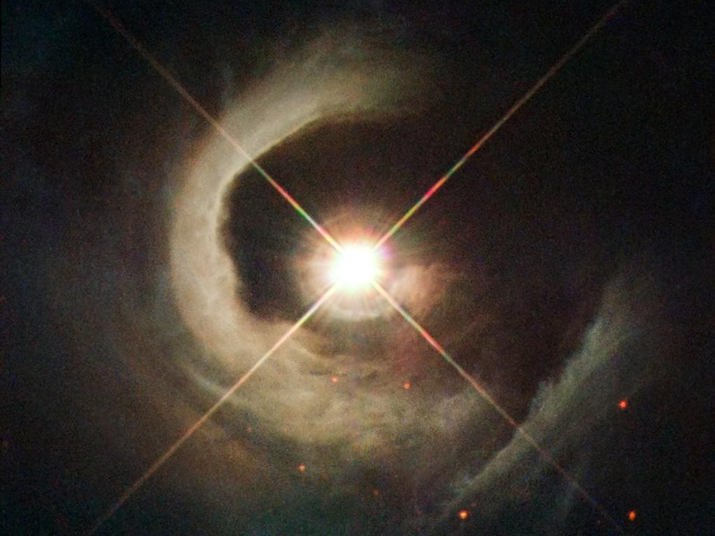 Discos de Acreção e Jatos Estrela T Tauri (estrela jovem em fase de contração).