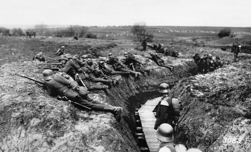 AP PHOTO/GLOWIMAGES A guerra de trincheiras ou Guerra de Posições Trincheiras: imensas valas cavadas na terra, que abrigavam os