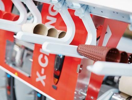 Remoção de bobinas: garantia de qualidade eficiente A esteira transportadora acelera suavemente e protege as bobinas cruzadas