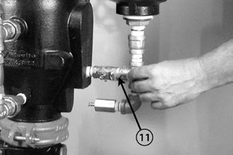 TESTE DE ALARME DE FLUXO DE ÁGUA Realize o teste de alarme de fluxo de água com a frequência exigida pelas normas nacionais.