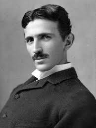 Histórico da Eletrônica Em 1885, Nikola Tesla inventa a corrente