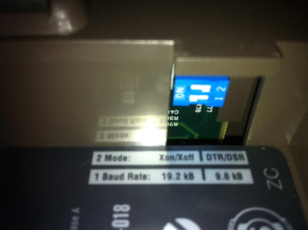 Configure os DIP switches da impressora para utilizar 19.2 kb e DTR/DSR - 1 ON, 2 - OFF 3. Desligue o PC e ligue novamente.