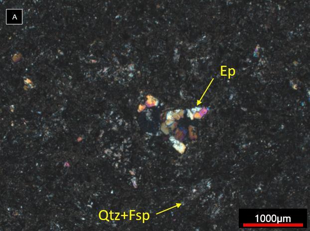 A) FSF003 336,38m: rocha porfirítica de granulação média composta por clorita em veio com