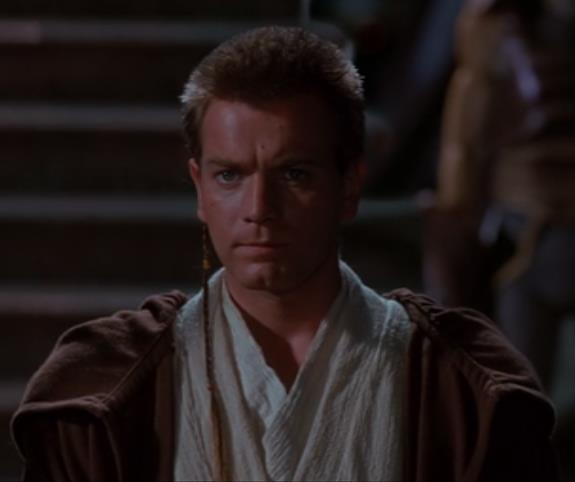 29 Figura 5 Obi-Wan Kenobi como Padawan. Fonte: Episódio I Ameaça Fantasma (1999). Obi-Wan é mostrado no Episódio I de cabelos curtos e com uma trança em destaque.