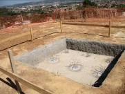 Construção de bases estruturais destinadas à instalação de caixas d água metálicas tipo taça e tubular para o CSL. O.