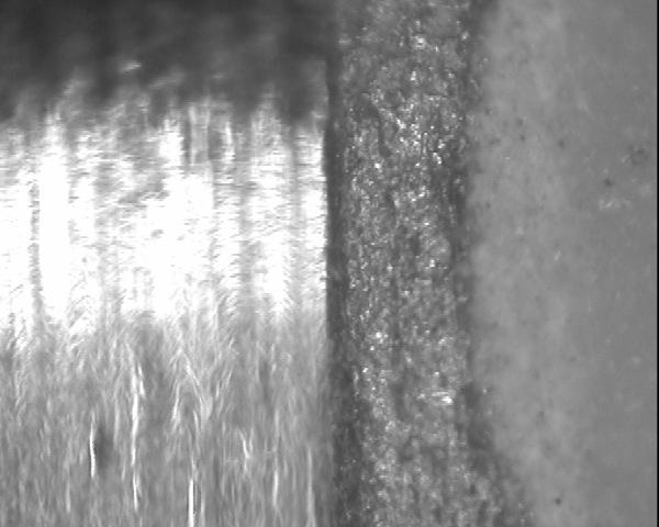 86 Padrão metálico Coping A B 100 µm FIGURA 16- Imagens obtidas no microscópio durante a mensuração da fenda: (A) adaptação marginal troquel/coping considerada ideal; (B) desadaptação marginal de