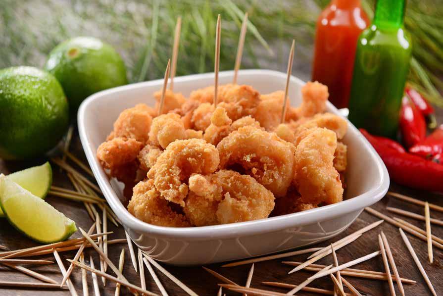 PETISCOS Isca de Mignon com Farofa de Ovos Tiras de mignon temperadas com tomate, cebola e ervas finas. Acompanha farofa de ovos (farinha de rosca) e manteiga temperada.