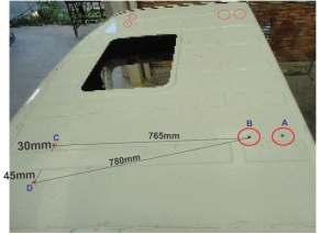 dianteira. Considerando as seguintes distâncias entre furos: B - C = 765mm. C - Friso = 30mm.